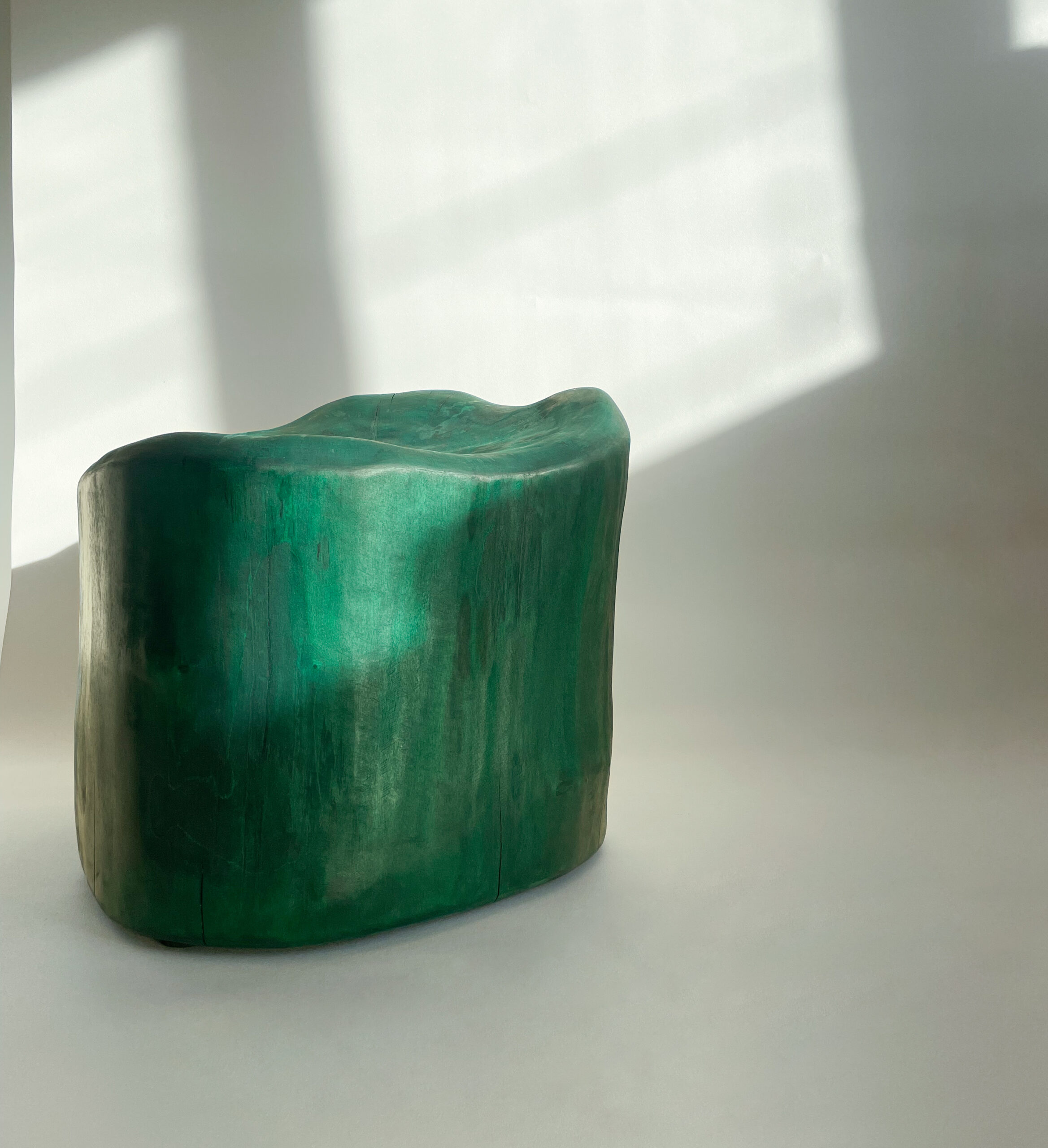 sculptural wooden stool by Serac K2 in tinted wood